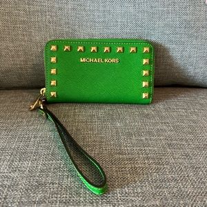 Michael Kors Wristlet with gold studs